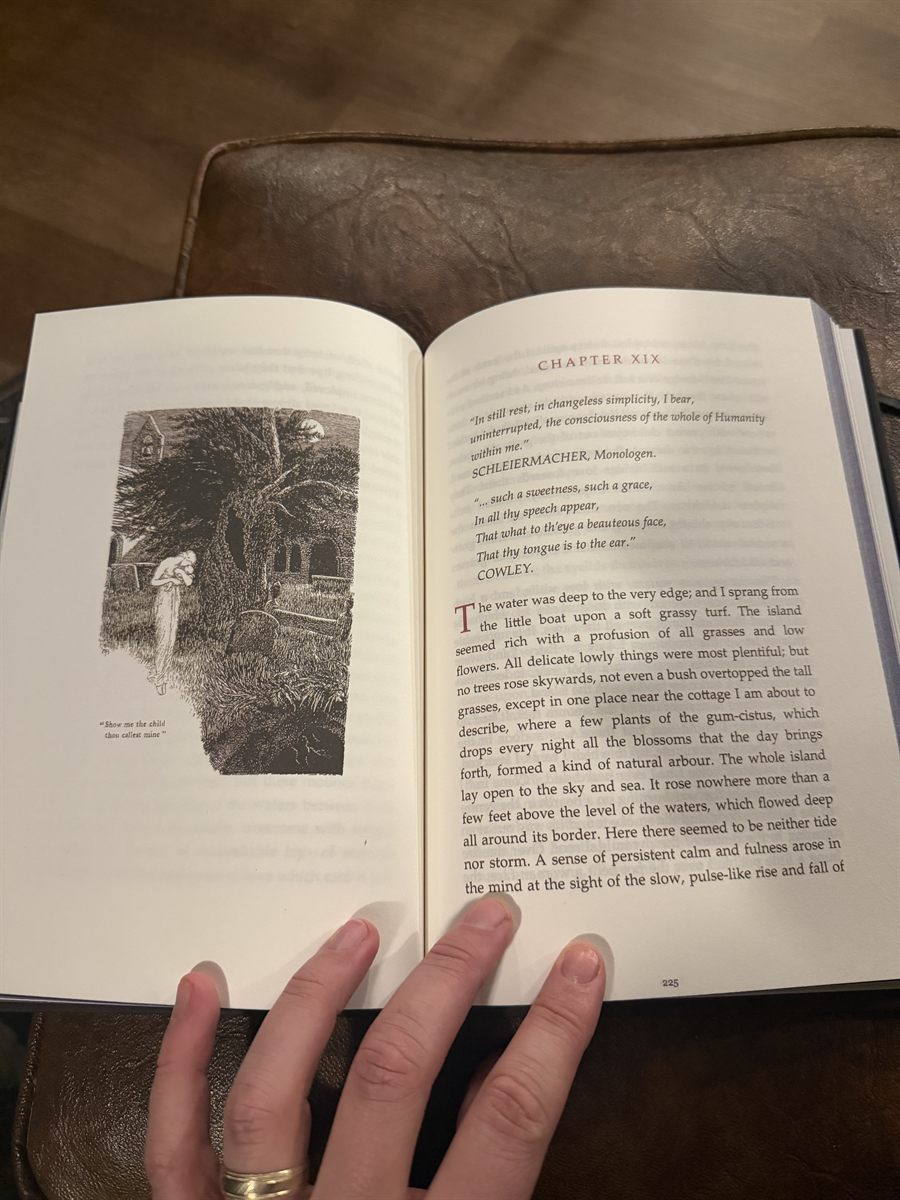 The book open at Chapter XIX, an Arthur Hughes plate facing a page with a red drop cap